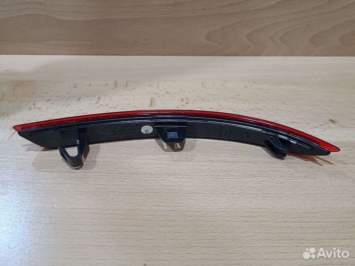 Катафот заднего бампера Opel Astra J