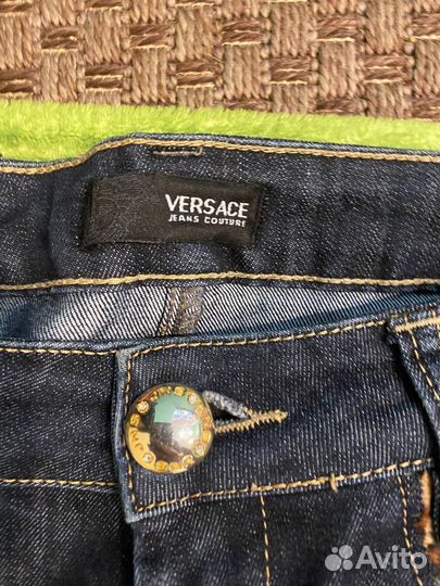 Джинсы versace