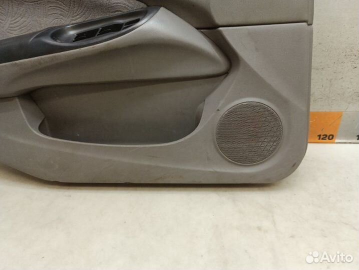 Обшивка двери передняя левая Nissan Almera N16 1.8