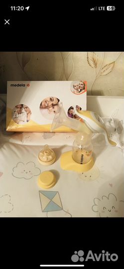 Молокоотсос medela ручной