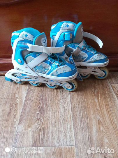 Роликовые коньки