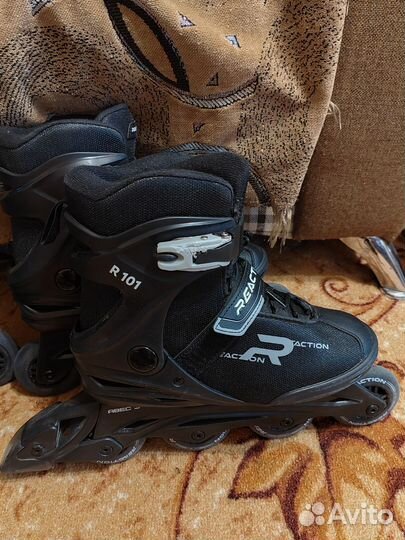 Роликовые коньки