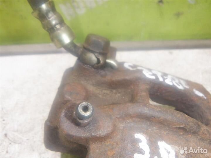 Суппорт задний правый Тойота Королла Е120