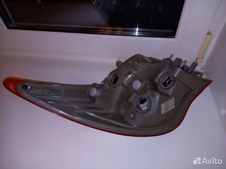 Фонарь правый на крыло Nissan Almera G15