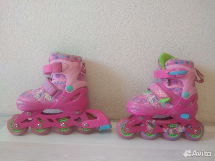 Роликовые коньки