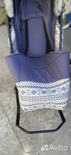 Детская санки-коляска для зимних прогулок