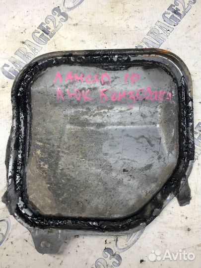 Крышка люка бензонасоса Mitsubishi Lancer X