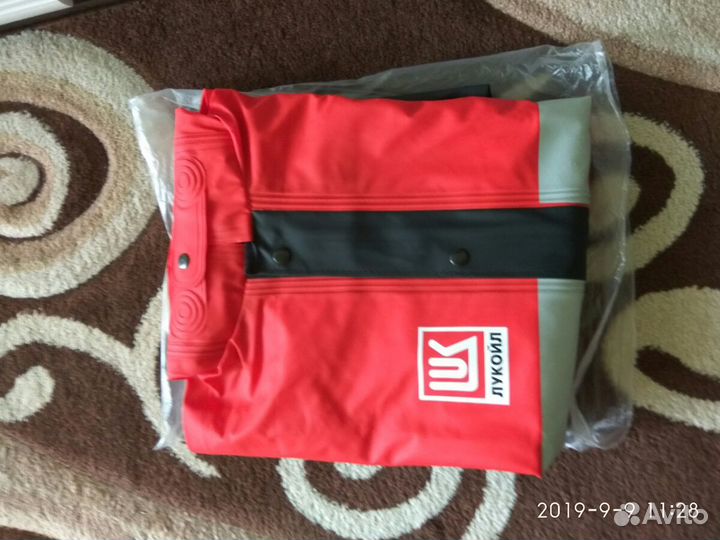 Плащ прорезиненый