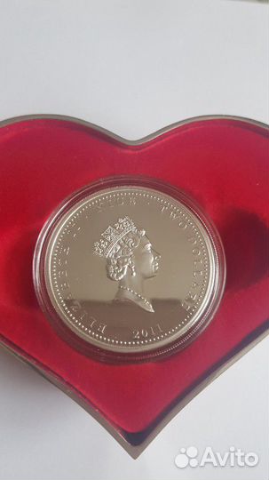 Серебряная монета в подарочной упаковке