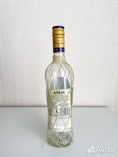 Пустая бутылка от Brugal Anejo