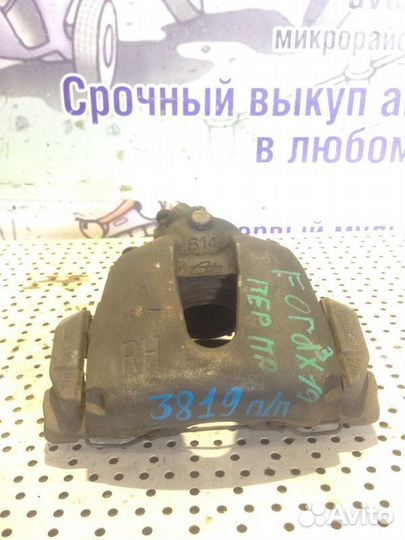 Суппорт тормозной передний правый Ford Focus