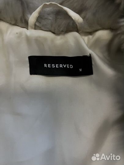 Меховая жилетка