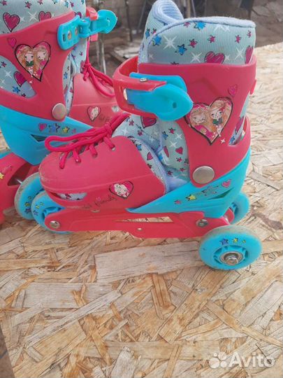 Роликовые коньки