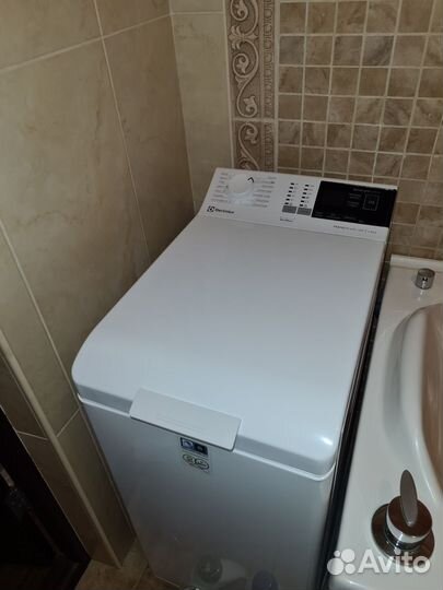 Стиральная машина с вертикальной загрузкой