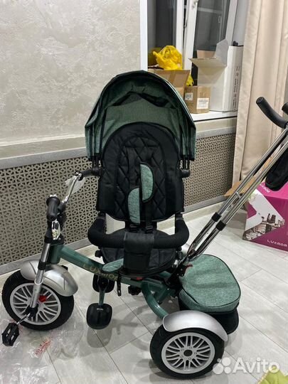 Детский трехколесный велосипед с ручкой