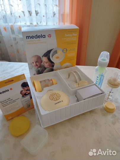 Молокоотсос medela электрический Swing Flex