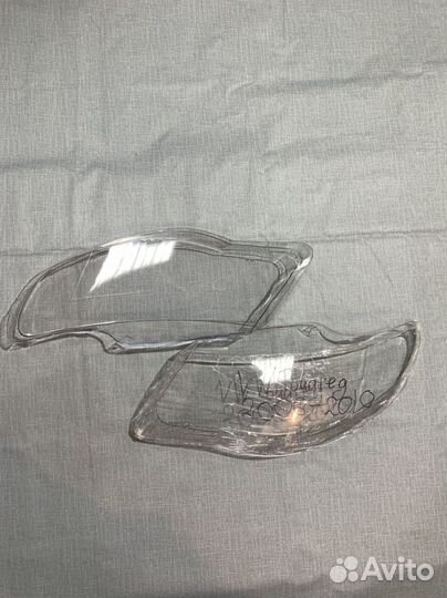 Новые стёкла фар Volkswagen Touareg
