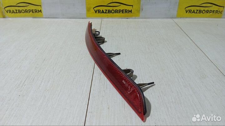 Отражатель в бампер задний правый Opel Astra J