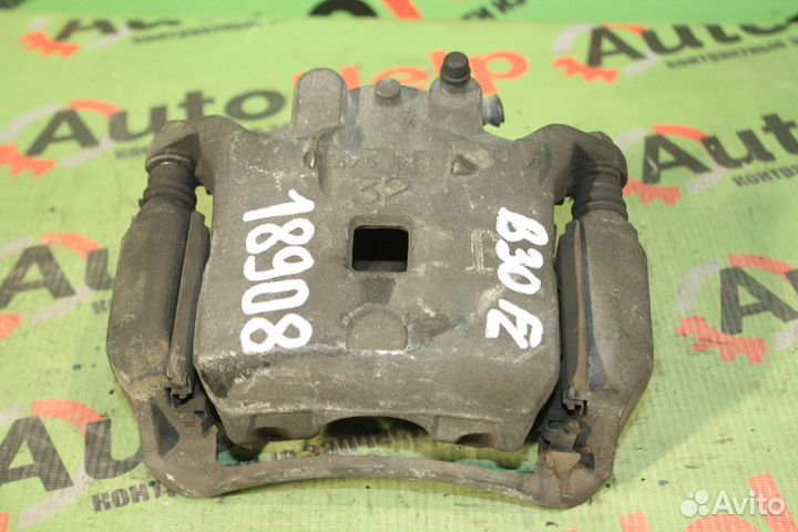 Суппорт nissan lafesta B30 передний левый