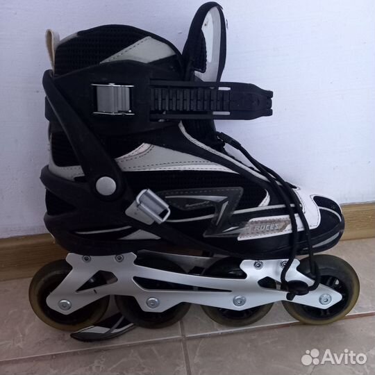 Коньки роликовые