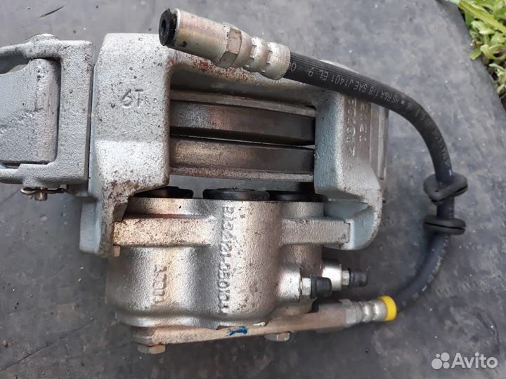 Суппорт передний левый