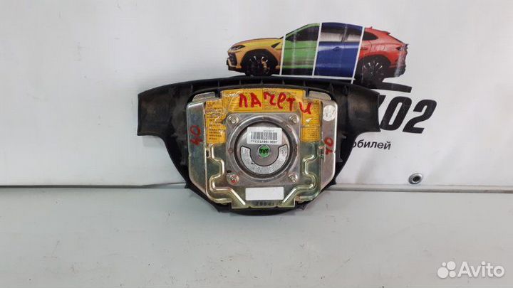 Подушка безопасности водителя (в рулевое колесо)