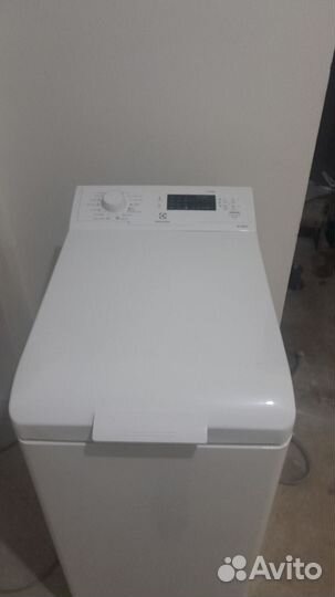 Стиральная машина с вертикальной загрузкой