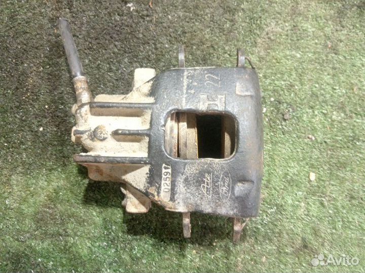 Суппорт тормозной передний левый Ford Focus split