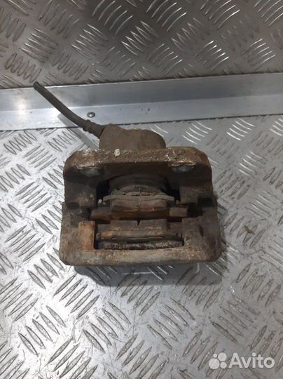 Суппорт передний левый Renault Logan K7M 2008