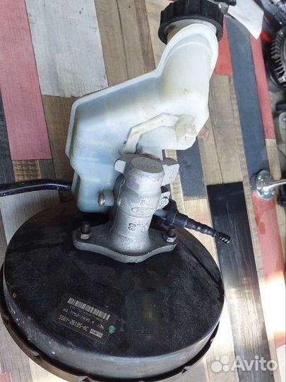 Главный тормозной цилиндр с вакумником Ford Fusion