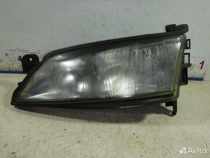 Фара левая Opel Vectra B