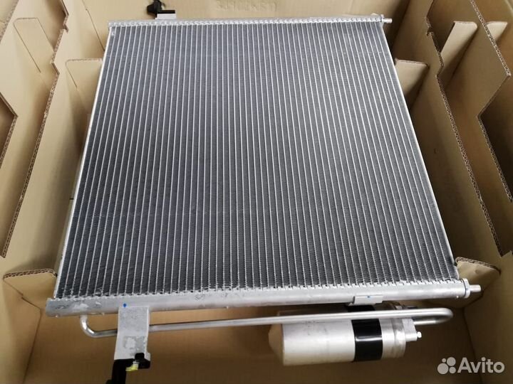 Радиатор кондиционера Mitsubishi L200 luzar