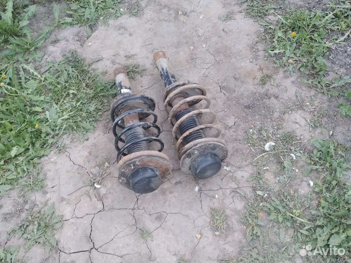 Стойки амортизатора Пежо 206