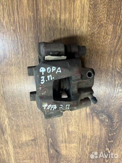 Суппорт тормозной задний правый Chery Fora А21 2