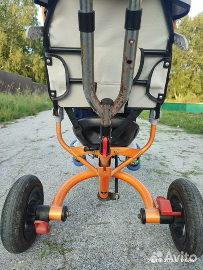 Трехколесный велосипед с ручкой