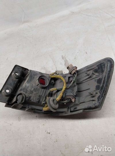 Фонарь задний левый toyota mark II gx100