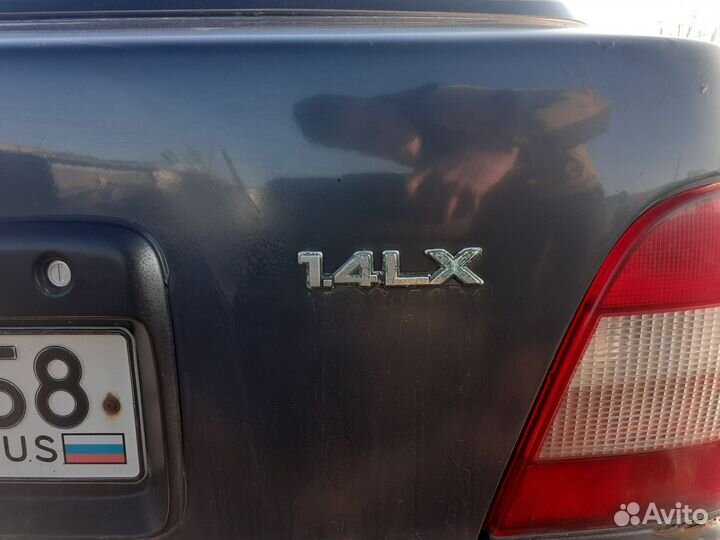 Шильдик Nissan Sunny