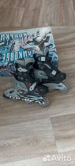 Роликовые коньки