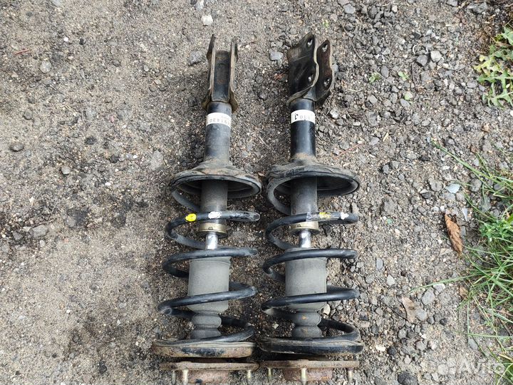 Стойки передние Митсубиси Лансер 9