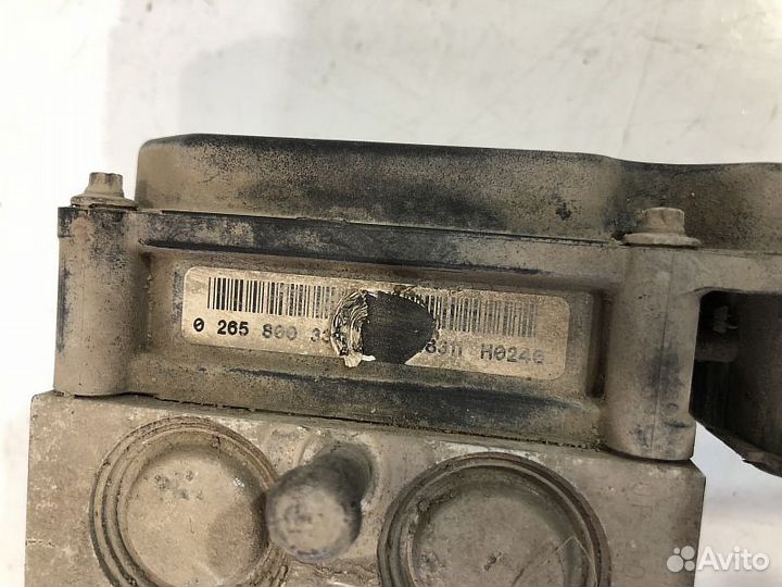 Блок ABS (насос) Nissan Primera P12 (2001-2008)