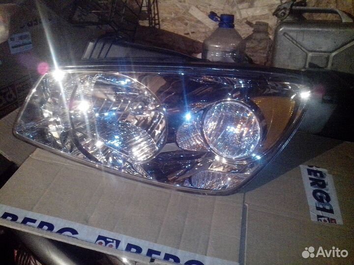 Фара левая для Kia Cerato 04-06 для амер. рынка
