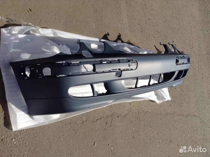 W210 00-02 Бампер передний с отверстиями под омыватели фар грунтованный (Тайвань)