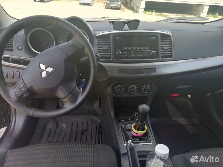 Штатная магнитола на Лансер 10 с рамкой