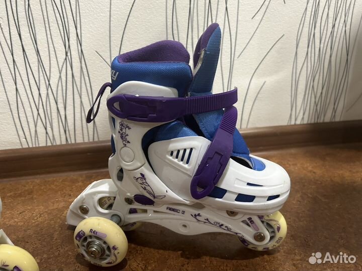 Роликовые коньки