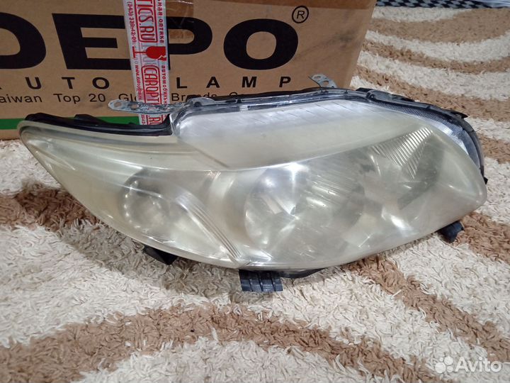Фара на toyota corolla Е150