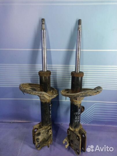 Стойка амортизатора передняя Kia Sportage 2