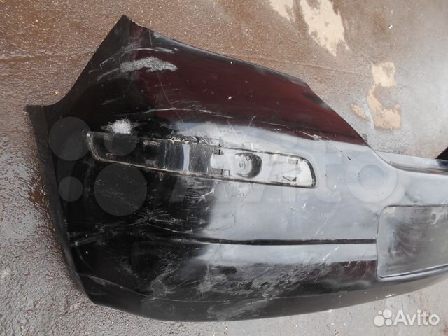 Бампер задний Nissan Tiida 2004-2010