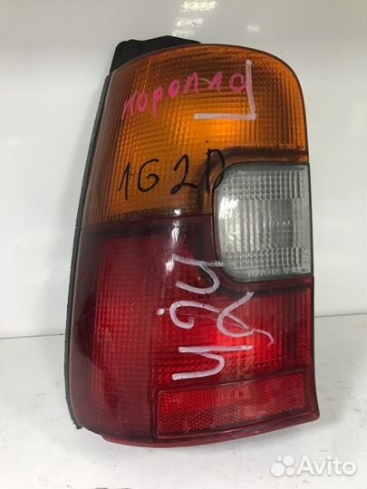 Фонарь задний левый Toyota Corolla AE 100 2C 1996