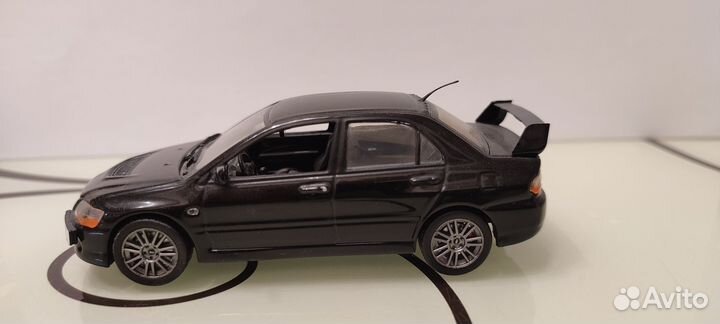 Mitsubishi lancer evolution 9 модель 1:43