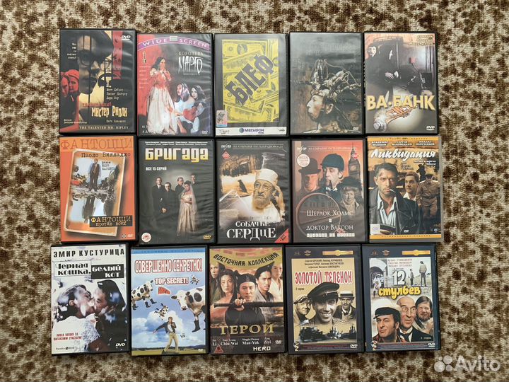 Коллекция DVD дисков с фильмами и сериалами